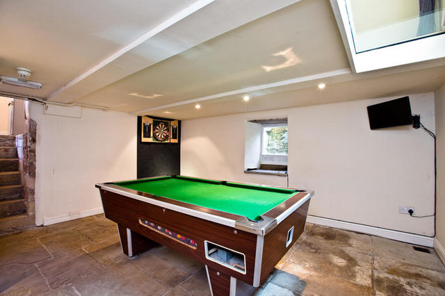 Games Room in Cellar with stone steps leading down