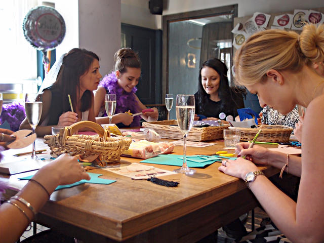 Group crafting at a hen party
