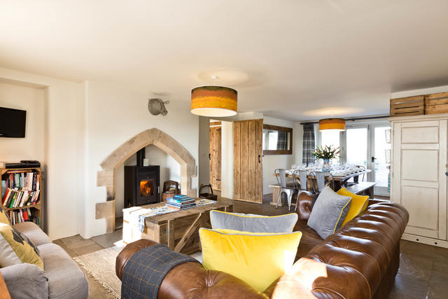 Open plan living/kitchen/dining are with log burner