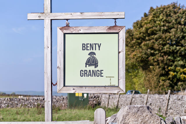 Signpost into drive of Benty Grange site