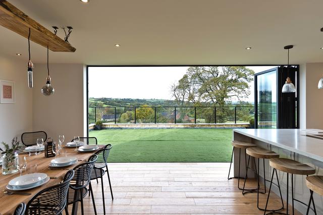 Bifold Doors from the kitchen open to a balcony
