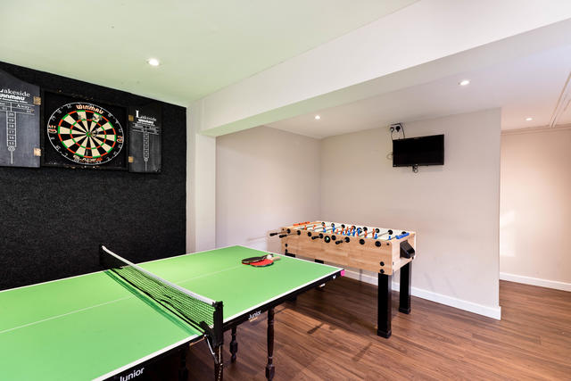 Games Room with junior table tennis table, table football-please note the darts board has now been taken out