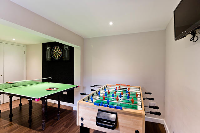 Games room with junior table tennis / table football please note the darts board is not in here anymore