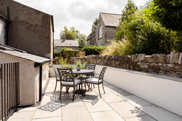 Secluded patio with garden furniture