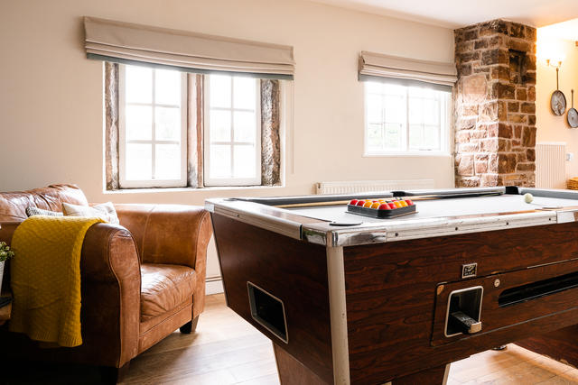 Pool Table and comfy seating in the bar area