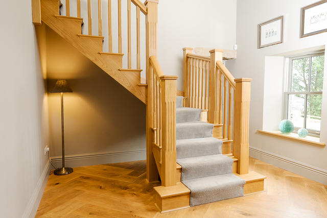 Stairs leading to the bedrooms