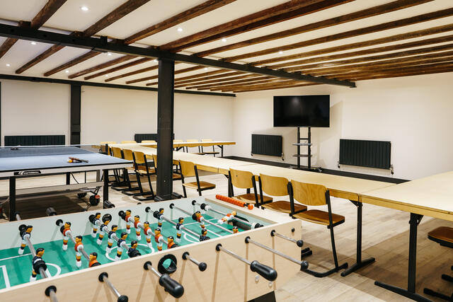 Flexible games room/meeting space with table tennis, table football and a pool table