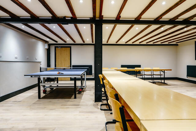 Flexible games room/meeting space with table tennis, table football and a pool table
