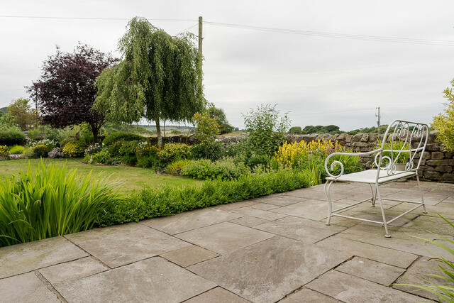 Seating area with views to the rear of the property