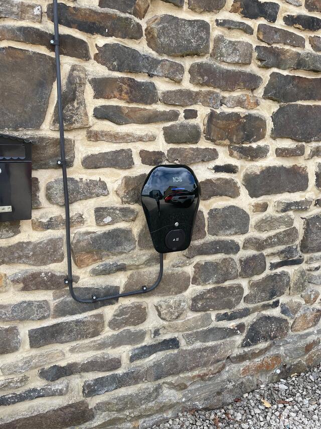 EV Charger on the gable end of main building