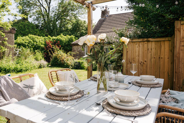 Outdoor dining space in the secluded rear garden