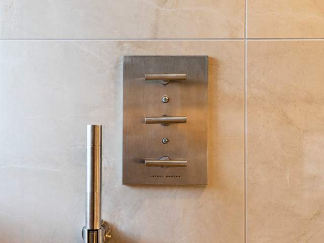 En suite wet room shower controls