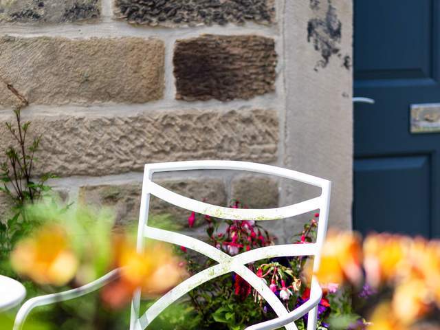 Small table and chairs ideal to enjoy breakfast outside