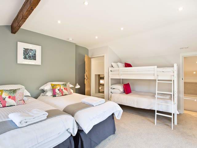 Bedroom 1 Double or Twin with full size bunk beds and en suite bathroom