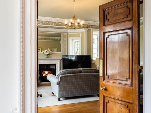 Double wooden doors to The Drawing Room