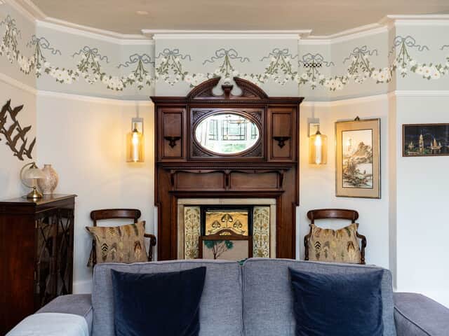 The decorative fireplace in The Garden Room