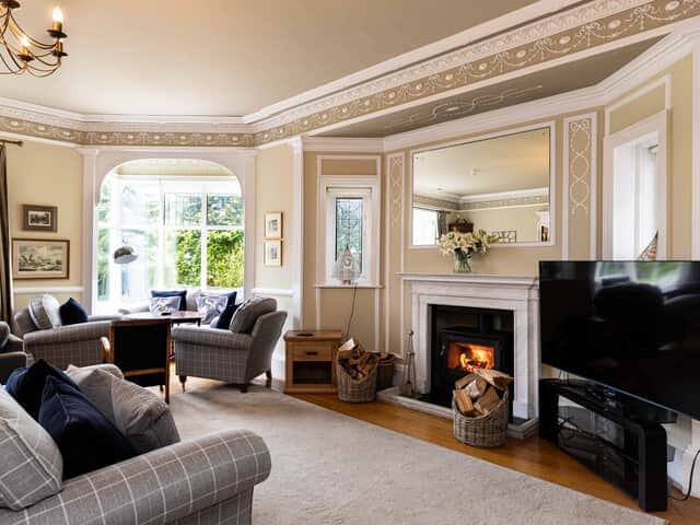 Cosy log burner in the centre of the room
