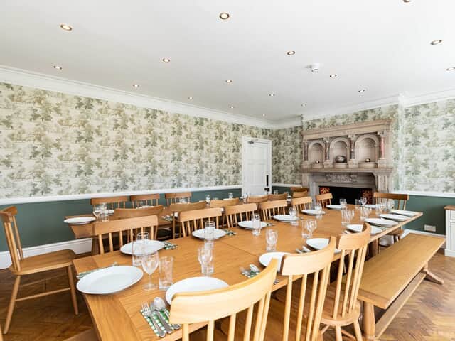 The formal dining room seats 30