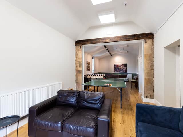 Games room with seating and TV