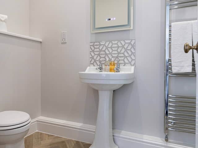 Bedroom 2 en suite with shower- 3 steps up to the room