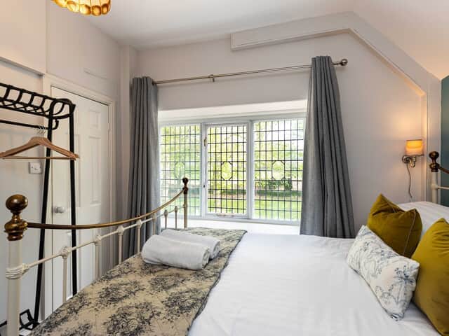Bedroom 6 with compact en suite