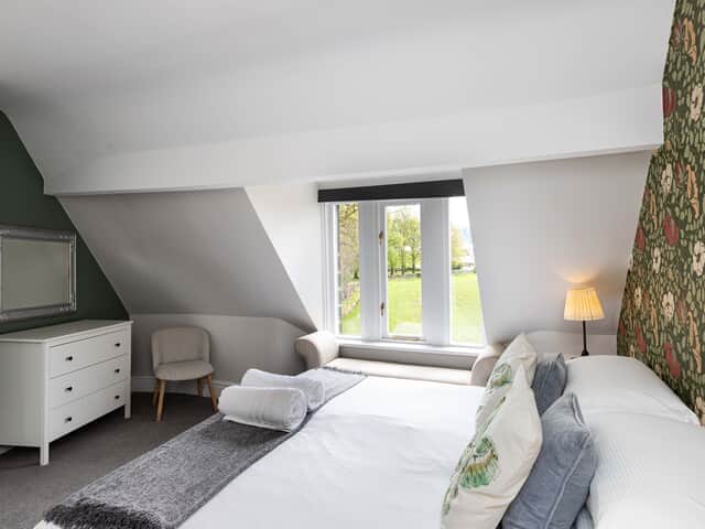 Bedroom 12 with sloping ceiling