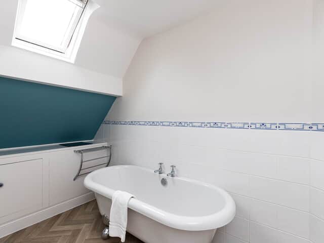 Bedroom 12 bathroom with bath and separate shower cubicle