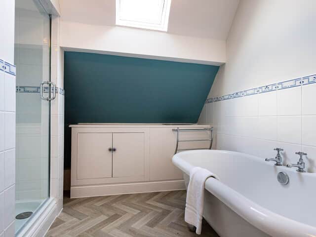 Bedroom 12 en suite with bath and separate shower cubicle