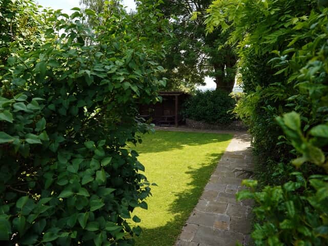 The garden area at Cliff House, next to the wood fired hot tub
