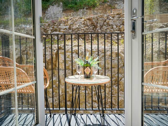 The balcony at Rock Mill Luxury Apartment 12 in Stoney Middleton