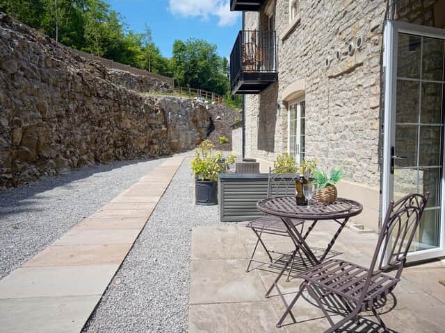 The outdoor area at your stay at Rock Mill Apartment 7 in Stoney Middleton