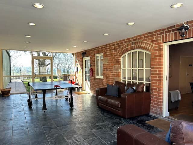 Table tennis in the social lounge with games room
