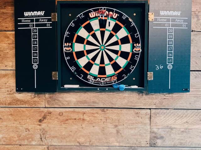 The Farmhouse Games room with dartboard