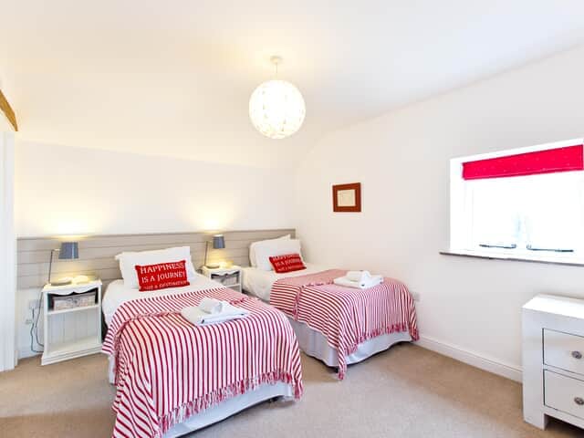 The Barn bedroom 3 with bunk beds &  shower over bath en suite 