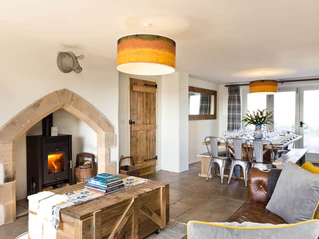 The Farmhouse lounge space with log burner