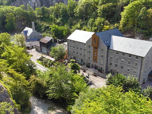 Rock Mill Apartments and The Cupola cafe next door