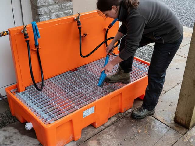 Muddy boots washing station onsite