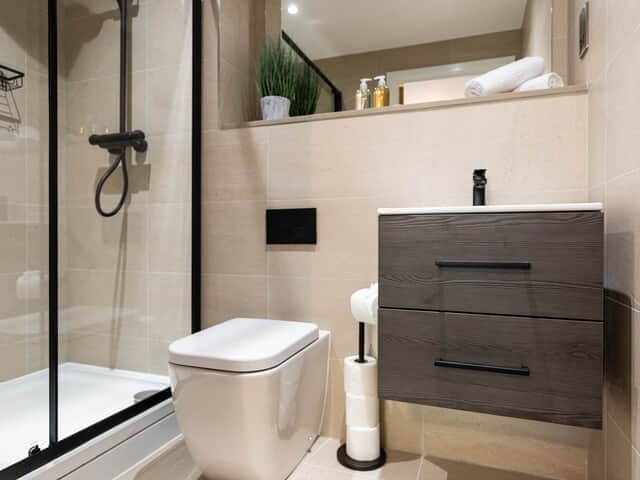 Bathroom with shower and underfloor heating