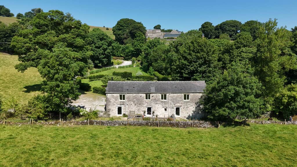 Aerial shot of the Stables at Priestcliffe with views of the front patio area